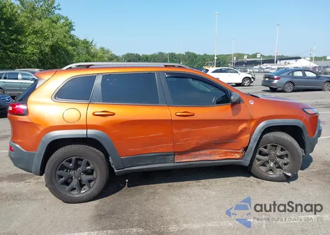 2015 Jeep Cherokee Trailhawk z USA, uszkodzony, nr VIN 1C4PJMBB9FW777381